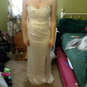Prom dress that is white with sequins and jewels